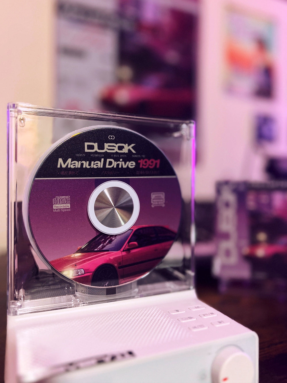 Manual Drive 1991 disc displayed in CD player